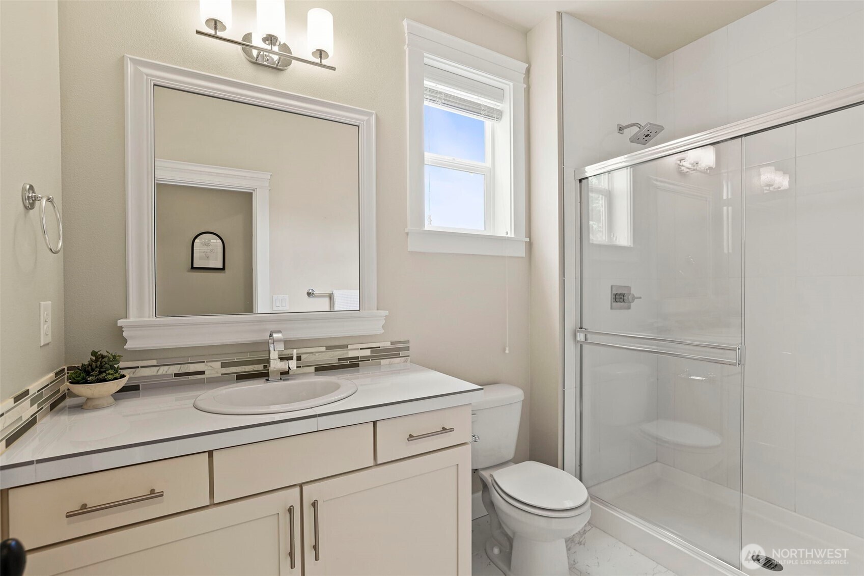 29 242nd Street Southeast Bothell, WA 98021 - Photo 28 of 40 a bathroom with a sink a toilet and shower