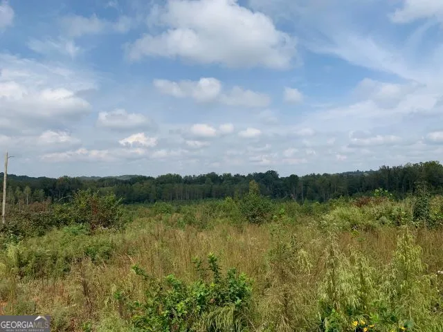 a view of lake with mountain