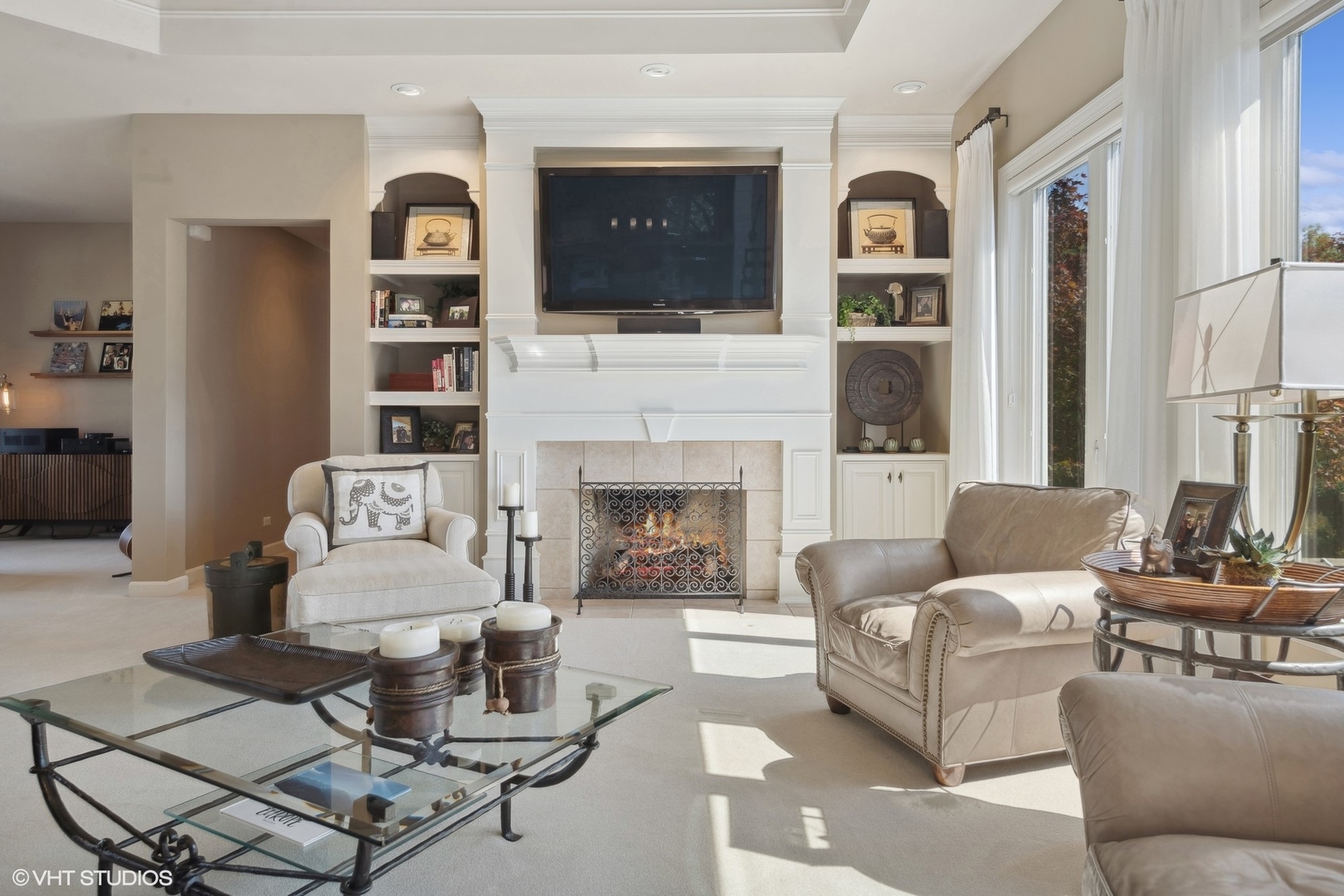 22258 North Foxtail Drive Kildeer, IL 60047 - Photo 13 of 50 a living room with furniture a flat screen tv and a fireplace