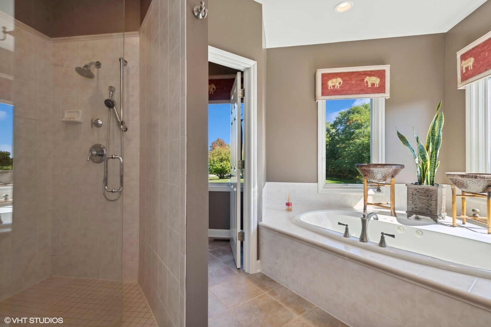 22258 North Foxtail Drive Kildeer, IL 60047 - Photo 18 of 50 a bathroom with a tub a sink and a large mirror