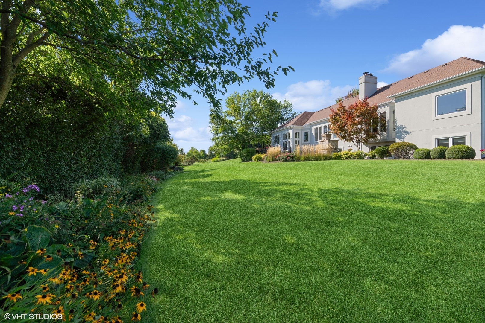 22258 North Foxtail Drive Kildeer, IL 60047 - Photo 34 of 50 a front view of a house with a garden