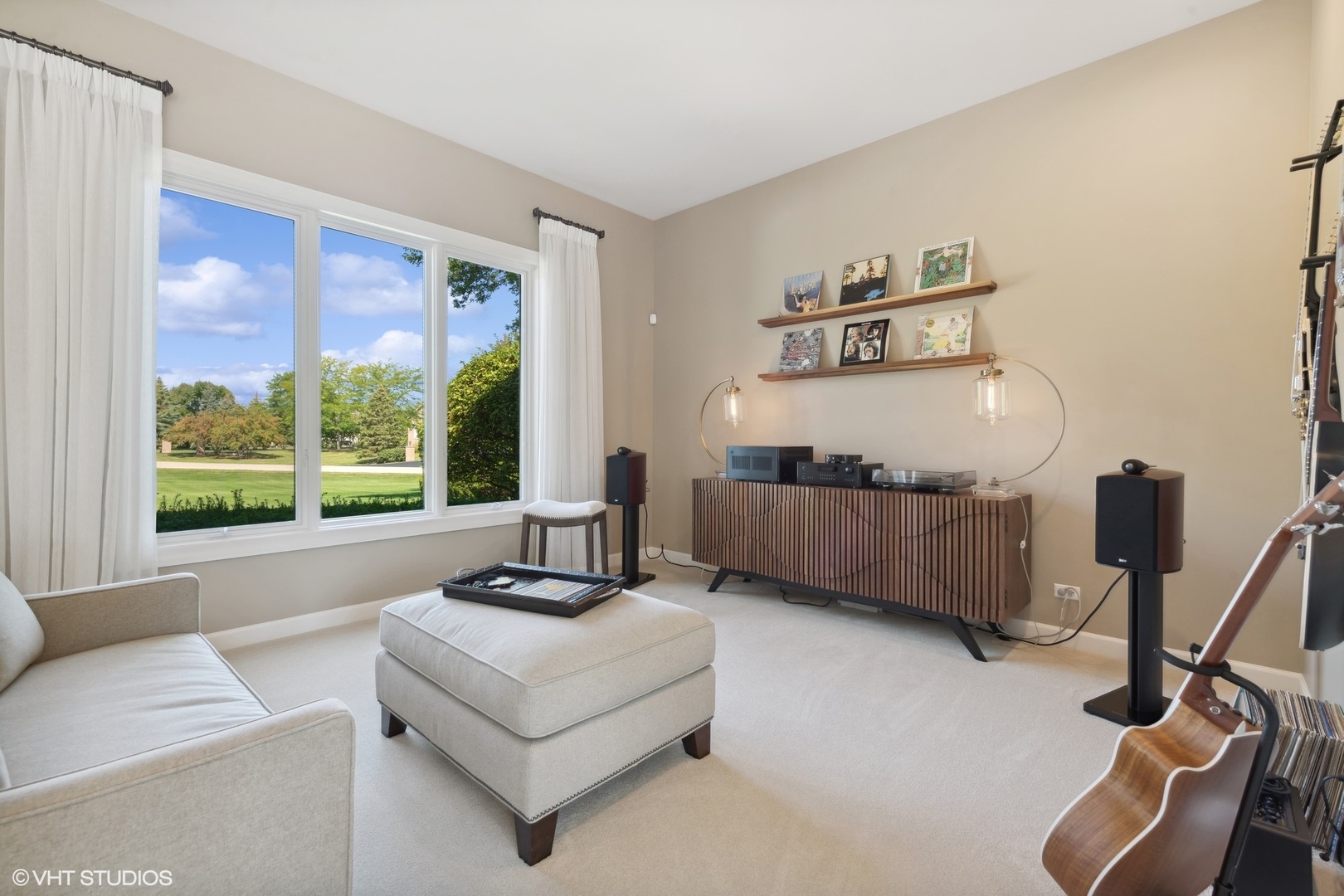 22258 North Foxtail Drive Kildeer, IL 60047 - Photo 4 of 50 a living room with furniture and a floor to ceiling window