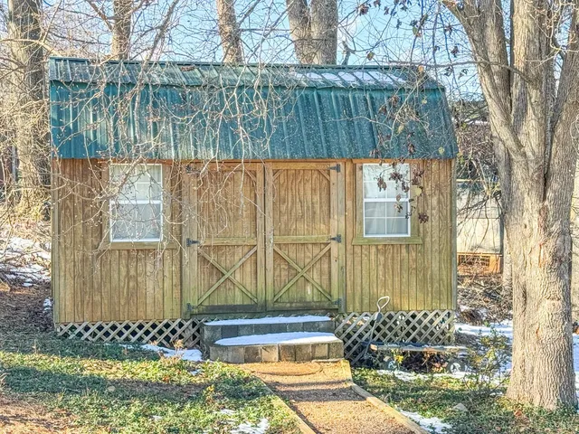 a picture of a book and a bed