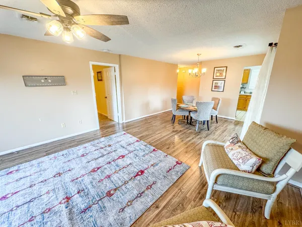 a spacious bedroom with a bed and a fireplace