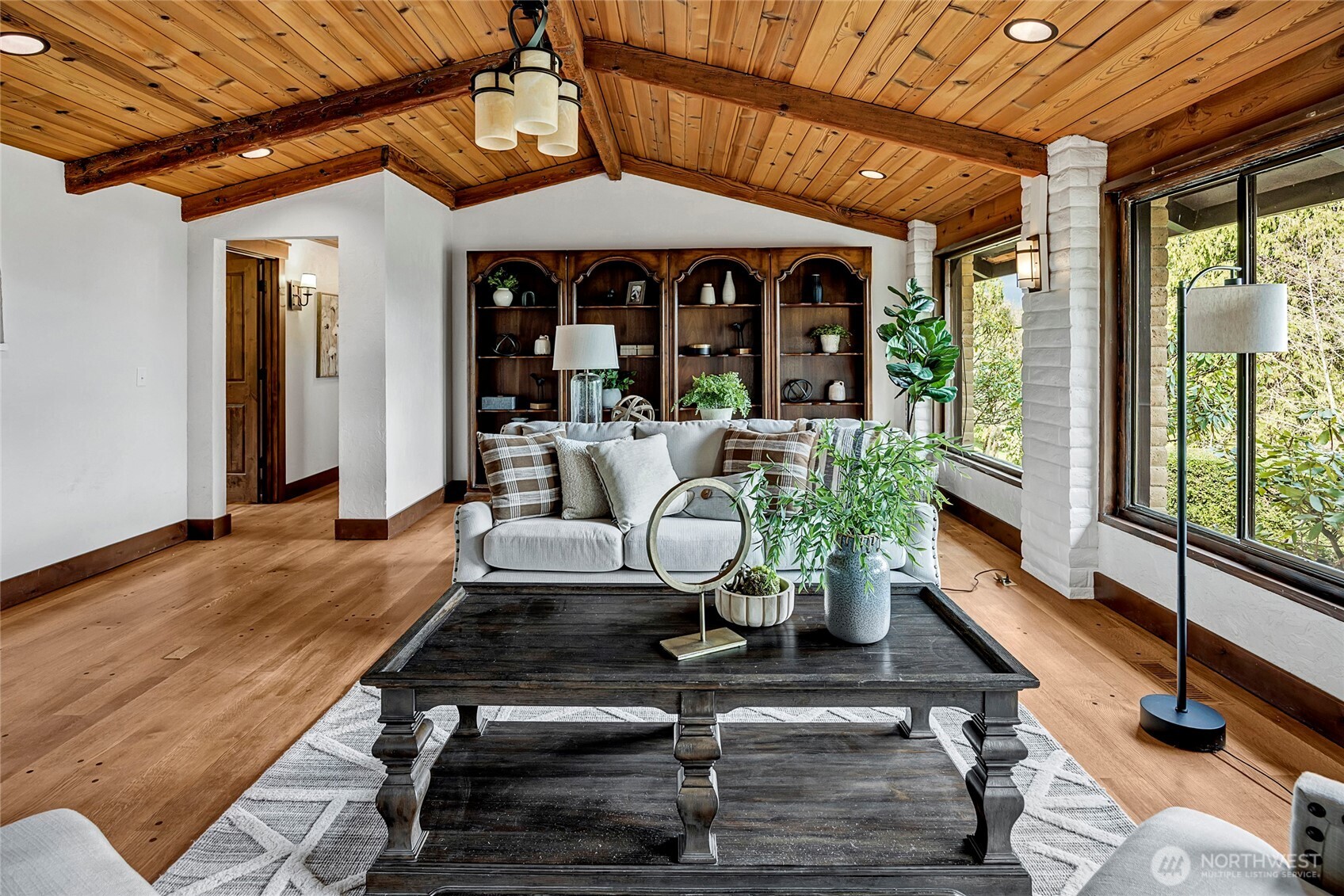16121 High Bridge Road Monroe, WA 98272 - Photo 11 of 40 a living room with furniture large windows and wooden floor