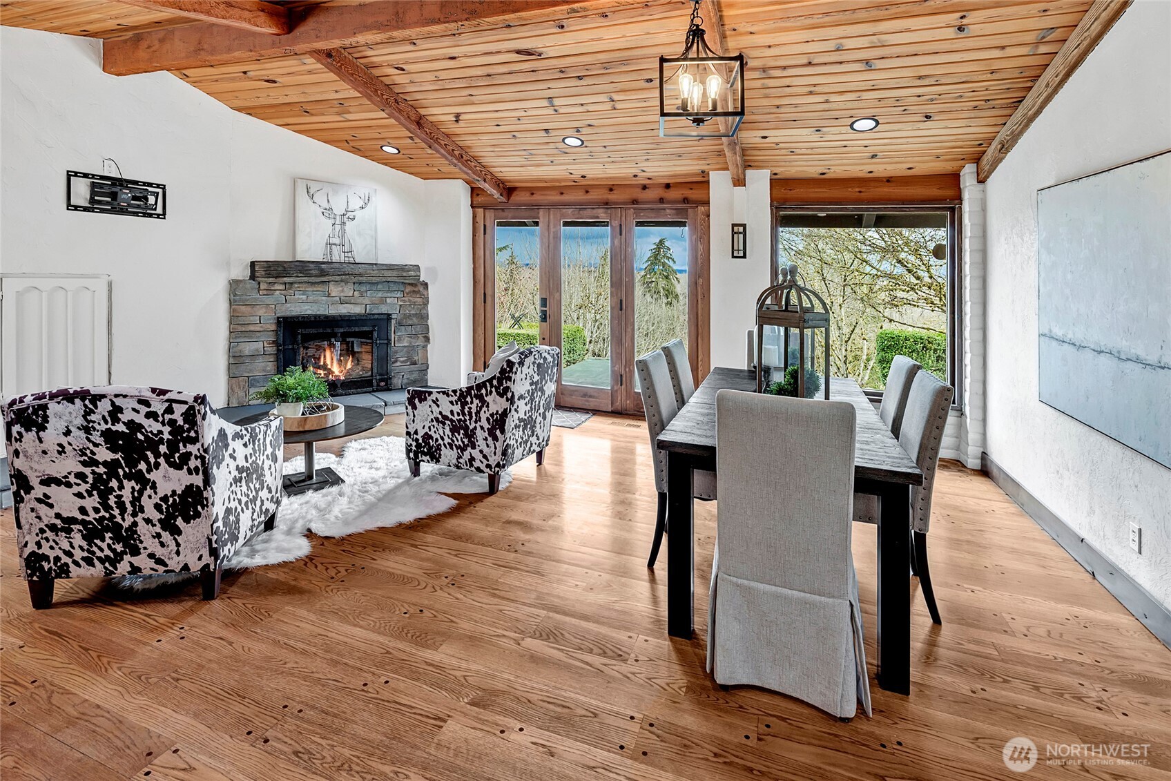 16121 High Bridge Road Monroe, WA 98272 - Photo 15 of 40 a living room with furniture large window and a fireplace