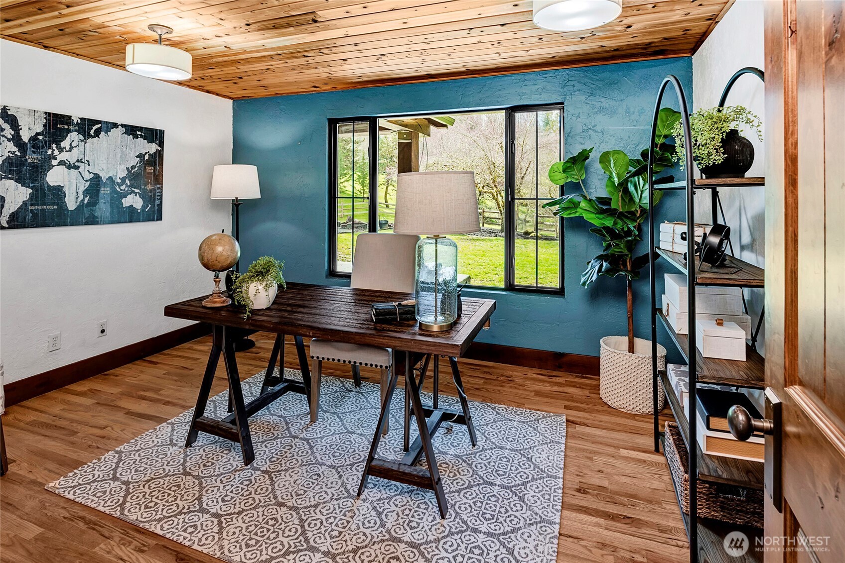 16121 High Bridge Road Monroe, WA 98272 - Photo 18 of 40 a workspace with furniture and a potted plant