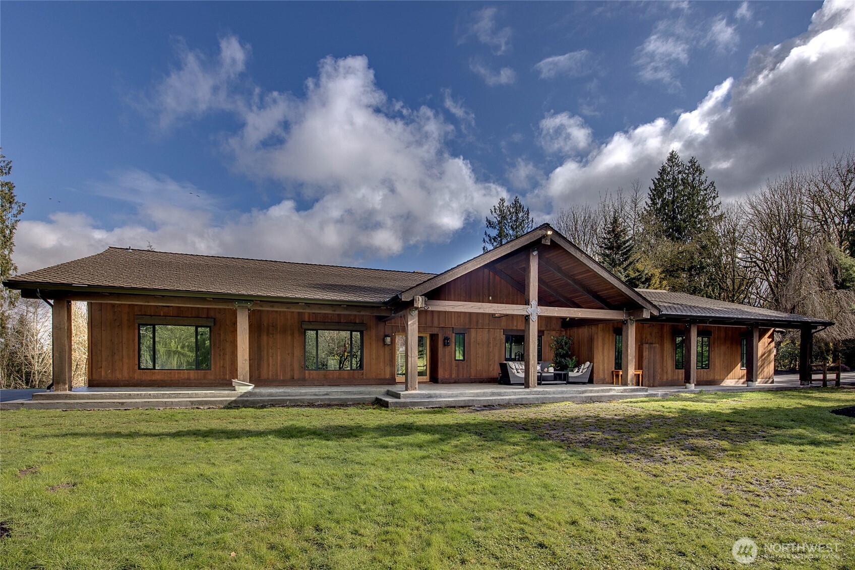 16121 High Bridge Road Monroe, WA 98272 - Photo 3 of 40 a front view of a house with a garden
