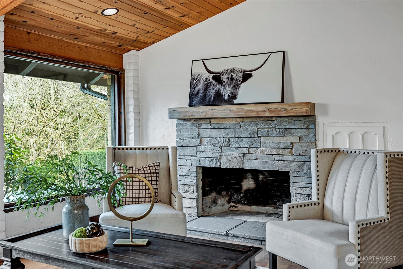 16121 High Bridge Road Monroe, WA 98272 - Photo 10 of 40 a living room with furniture and a fireplace