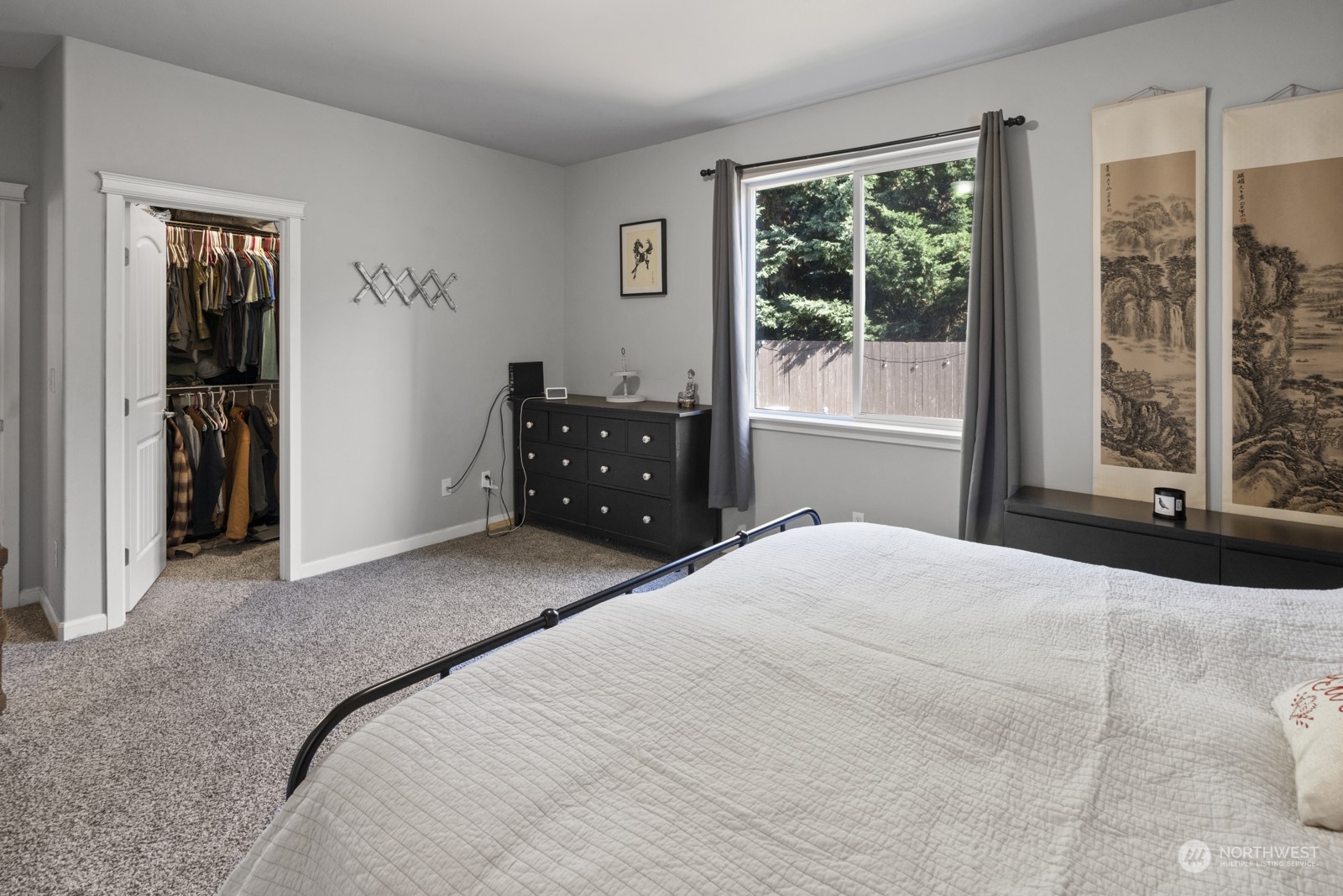 1330 Farina Loop Southeast Olympia, WA 98513 - Photo 15 of 35 a bedroom with a bed and large window