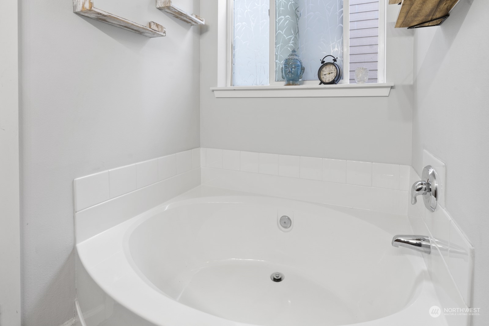 1330 Farina Loop Southeast Olympia, WA 98513 - Photo 18 of 35 a white bath tub sitting next to a window