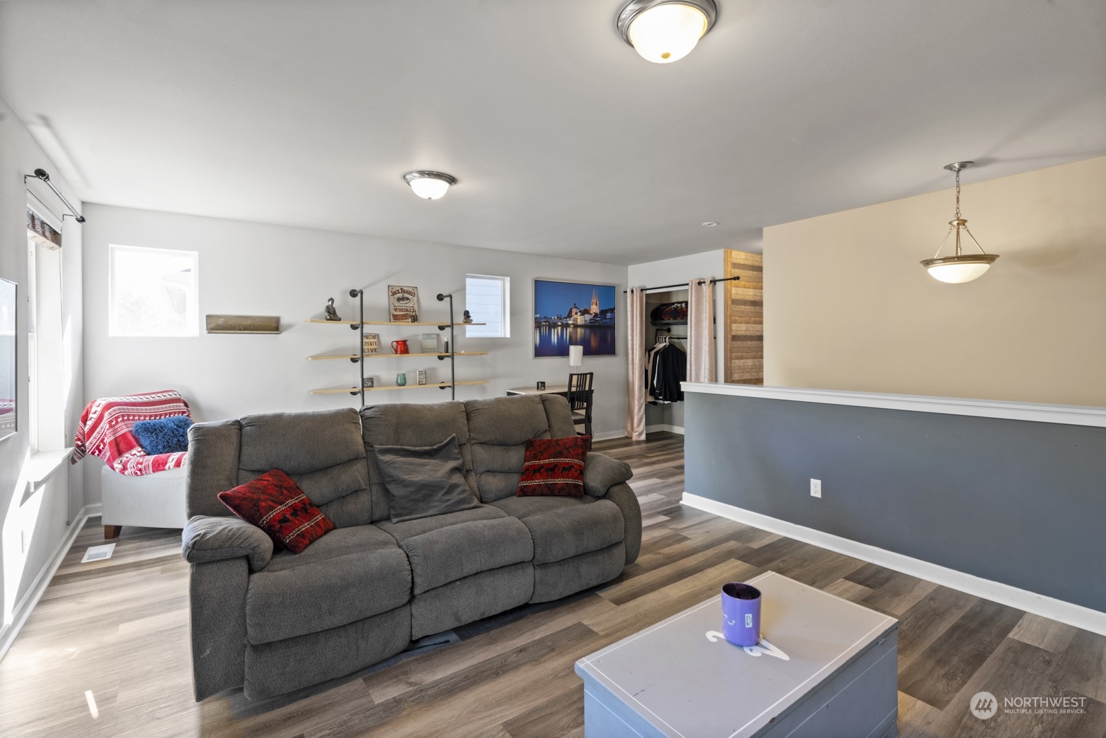 1330 Farina Loop Southeast Olympia, WA 98513 - Photo 19 of 35 a living room with furniture and a wooden floor