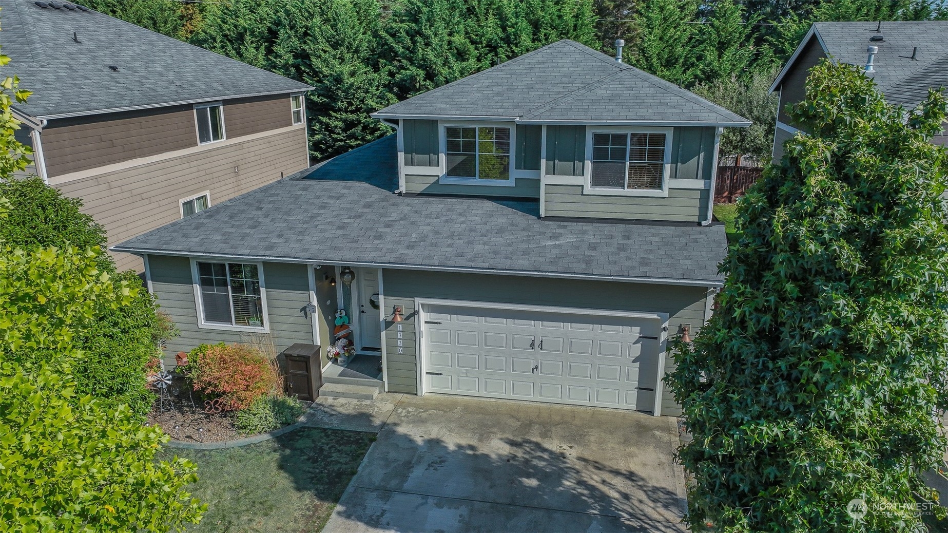 1330 Farina Loop Southeast Olympia, WA 98513 - Photo 29 of 35 front view of a house with a yard