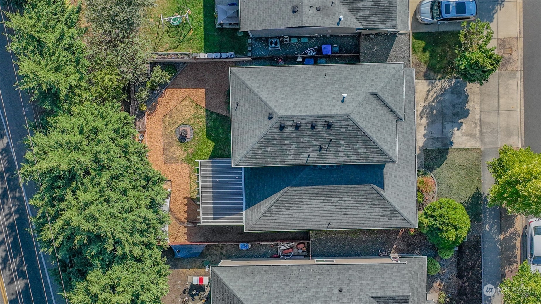 1330 Farina Loop Southeast Olympia, WA 98513 - Photo 30 of 35 an aerial view of a house with a yard and sitting area