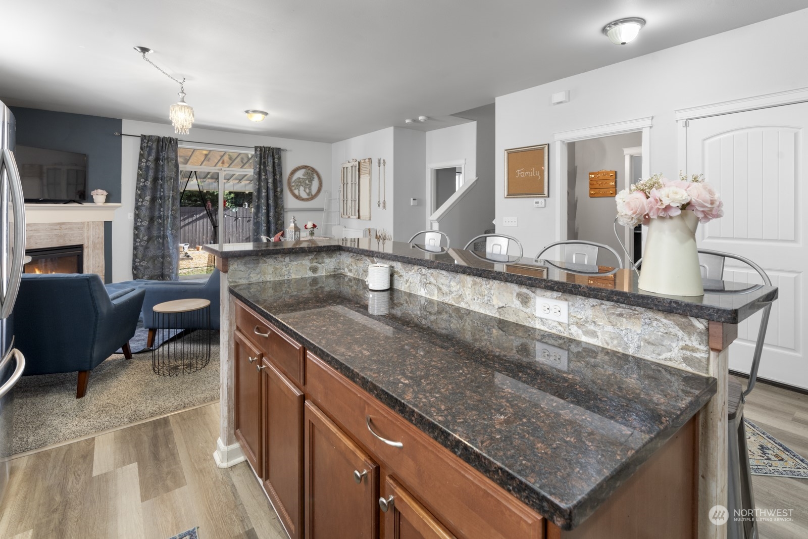 1330 Farina Loop Southeast Olympia, WA 98513 - Photo 6 of 35 a kitchen with a stove a sink and a refrigerator