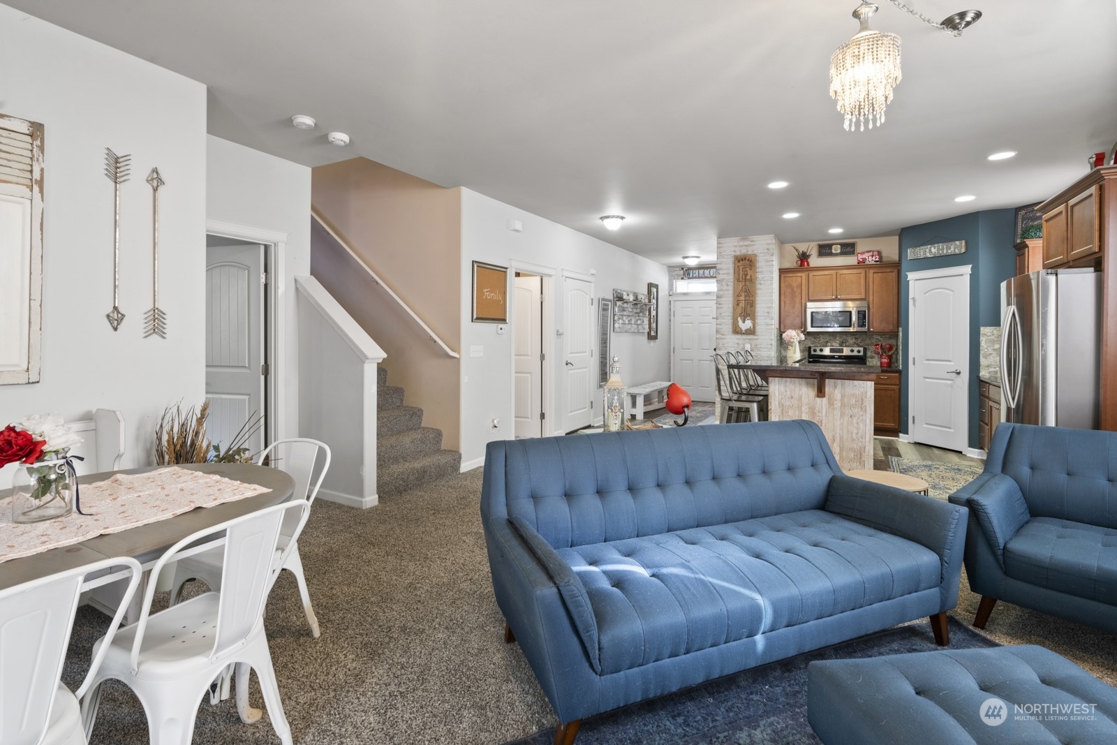 1330 Farina Loop Southeast Olympia, WA 98513 - Photo 7 of 35 a living room with furniture and kitchen view