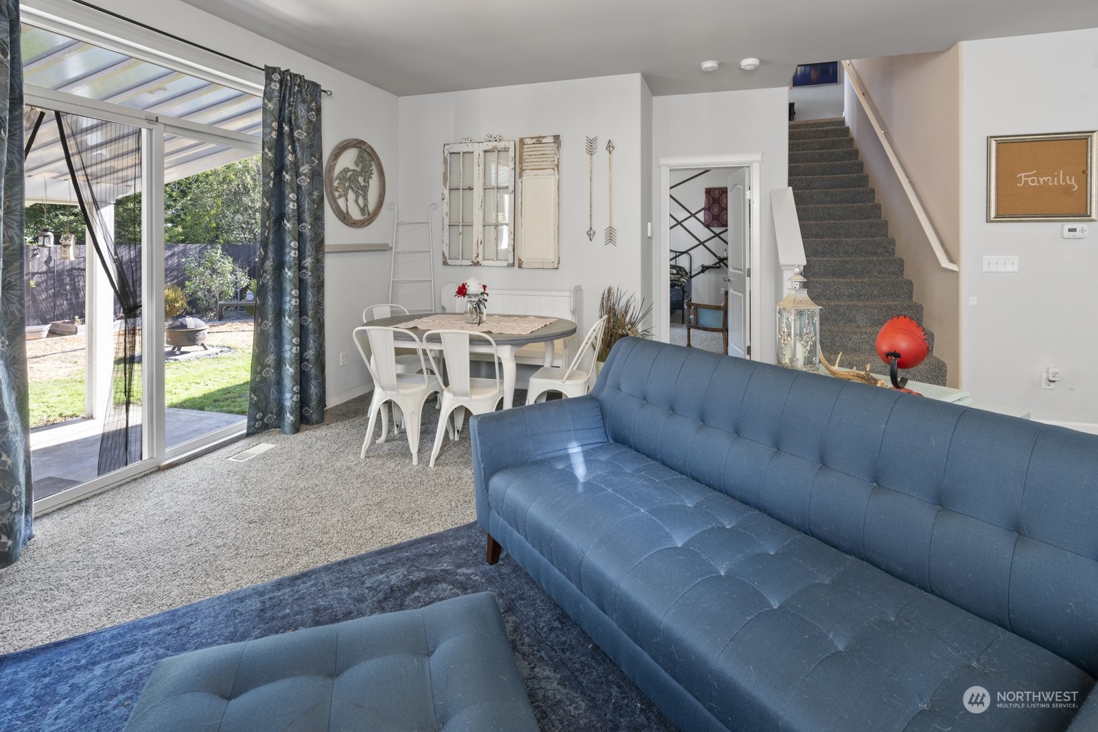 1330 Farina Loop Southeast Olympia, WA 98513 - Photo 8 of 35 a living room with furniture and a large window