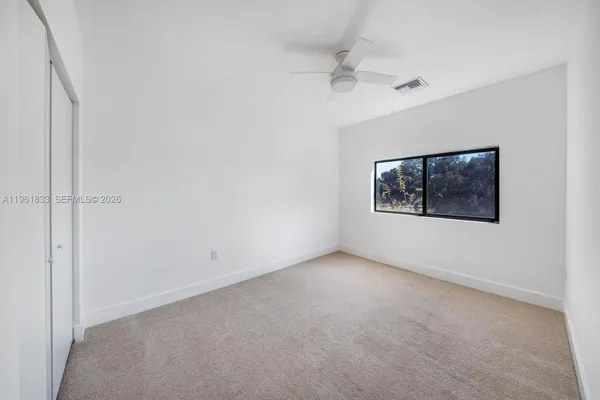 an empty room with a window