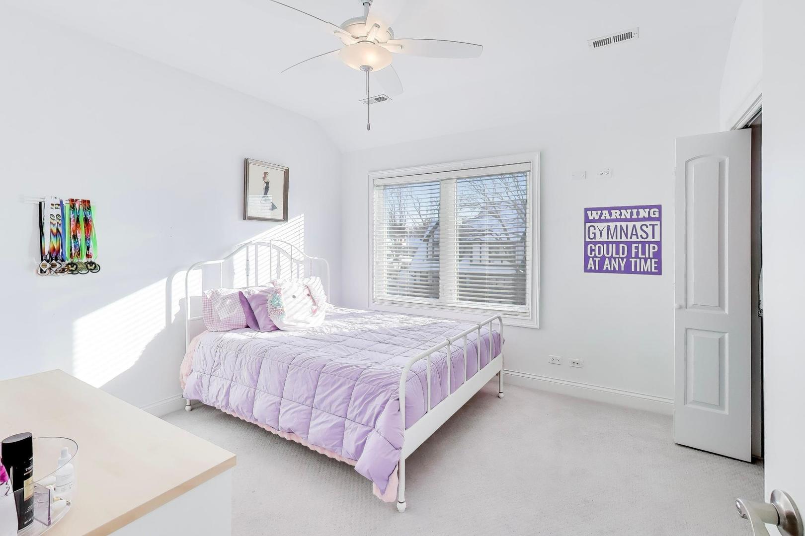 229 North Myrtle Avenue Elmhurst, IL 60126 - Photo 26 of 43 a bedroom with a bed and a window