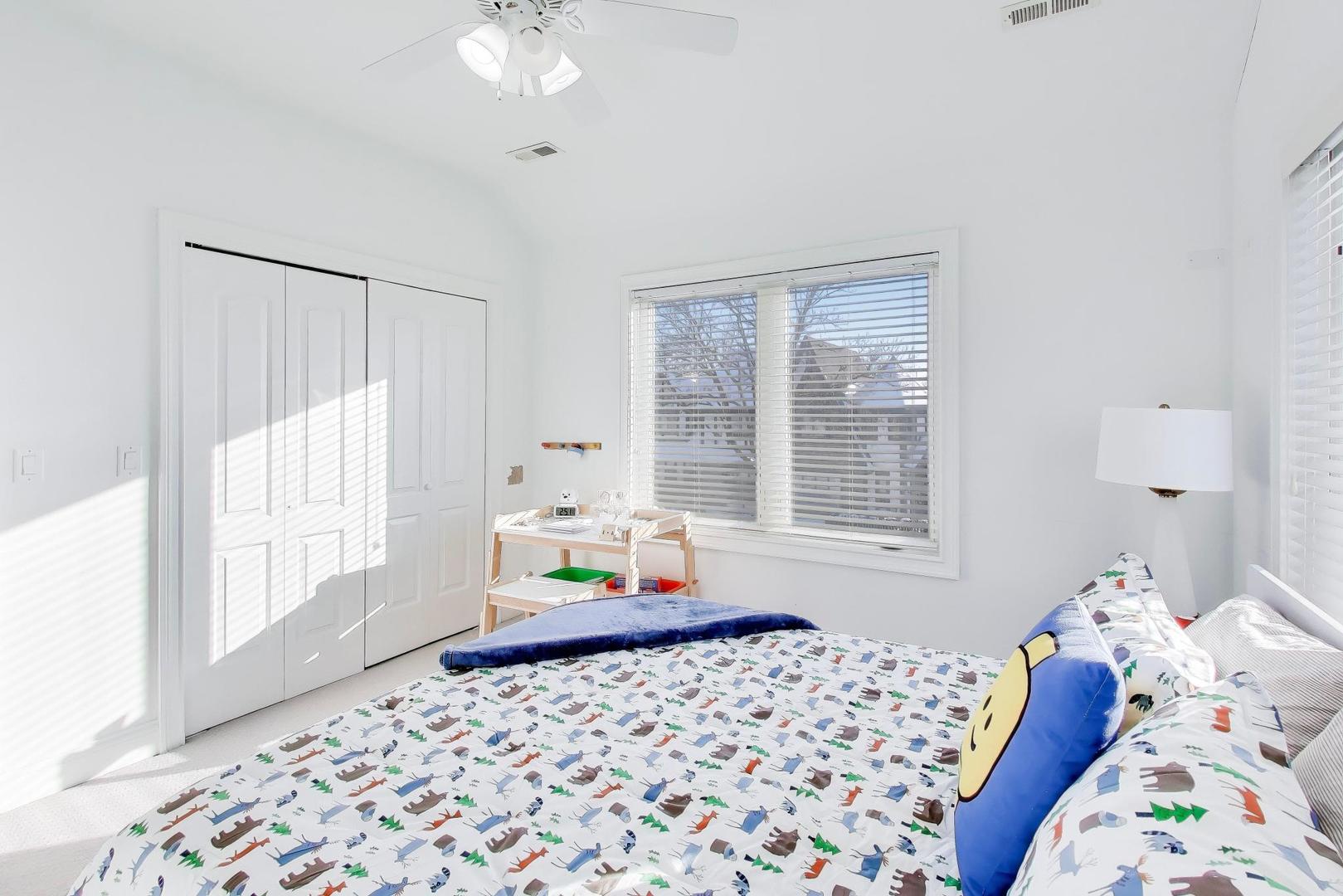 229 North Myrtle Avenue Elmhurst, IL 60126 - Photo 29 of 43 a bedroom with a bed and window