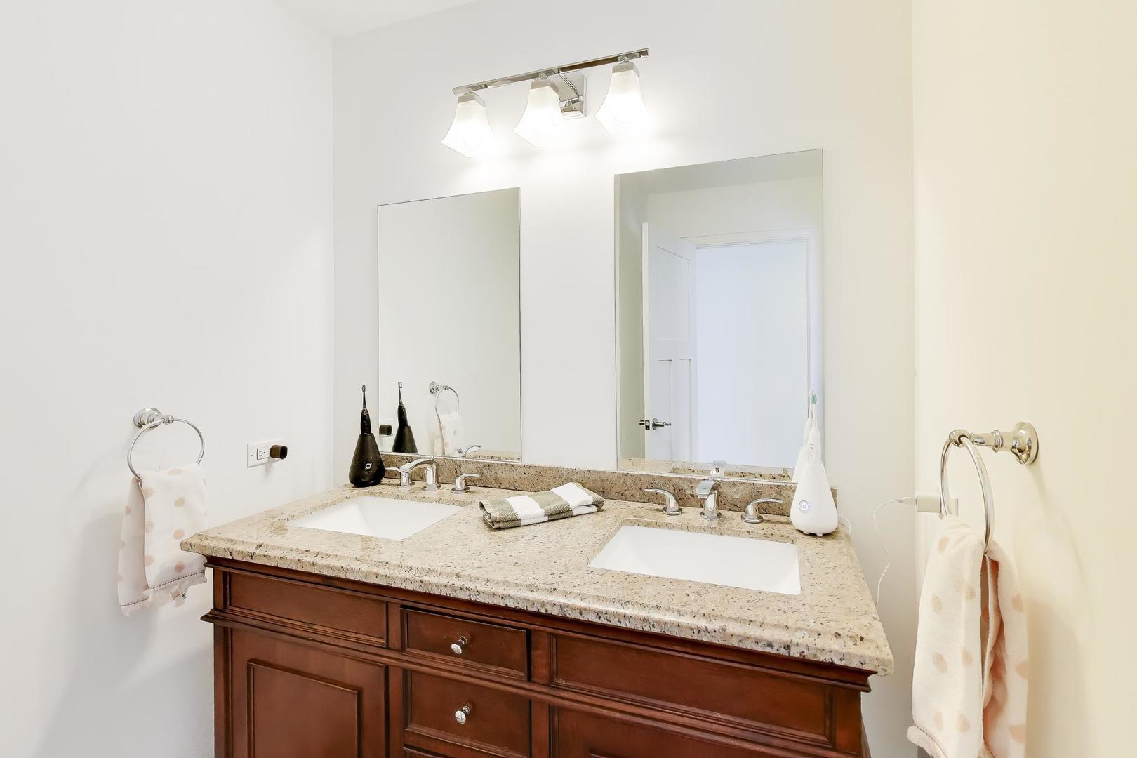 229 North Myrtle Avenue Elmhurst, IL 60126 - Photo 32 of 43 a bathroom with a granite countertop sink and a mirror