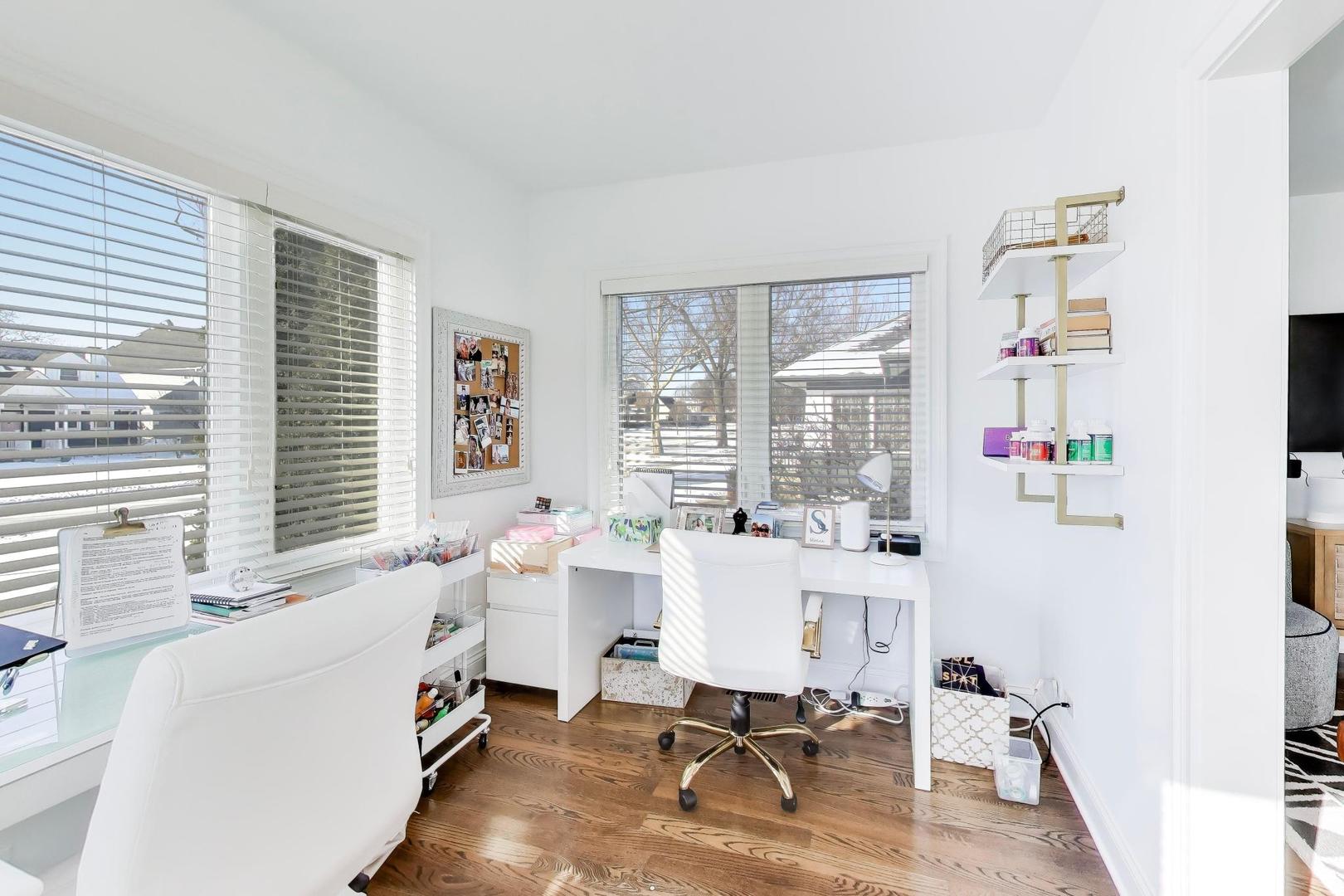 229 North Myrtle Avenue Elmhurst, IL 60126 - Photo 9 of 43 a room with furniture a large window and table