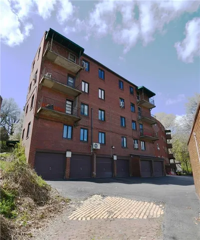 a car parked in front of a house