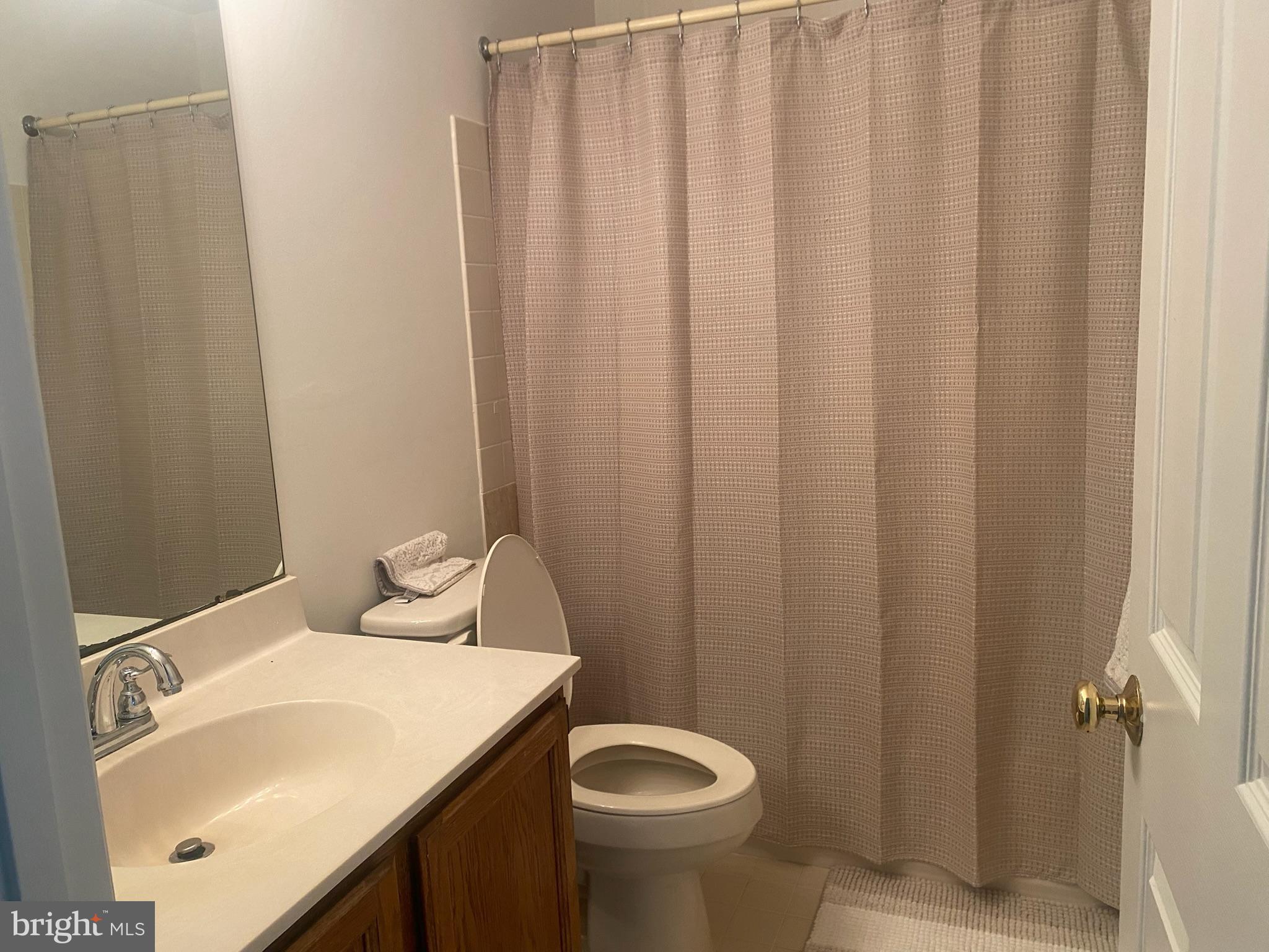 113 North Park Road Newtown, PA 18940 - Photo 17 of 27 a bathroom with a sink and toilet