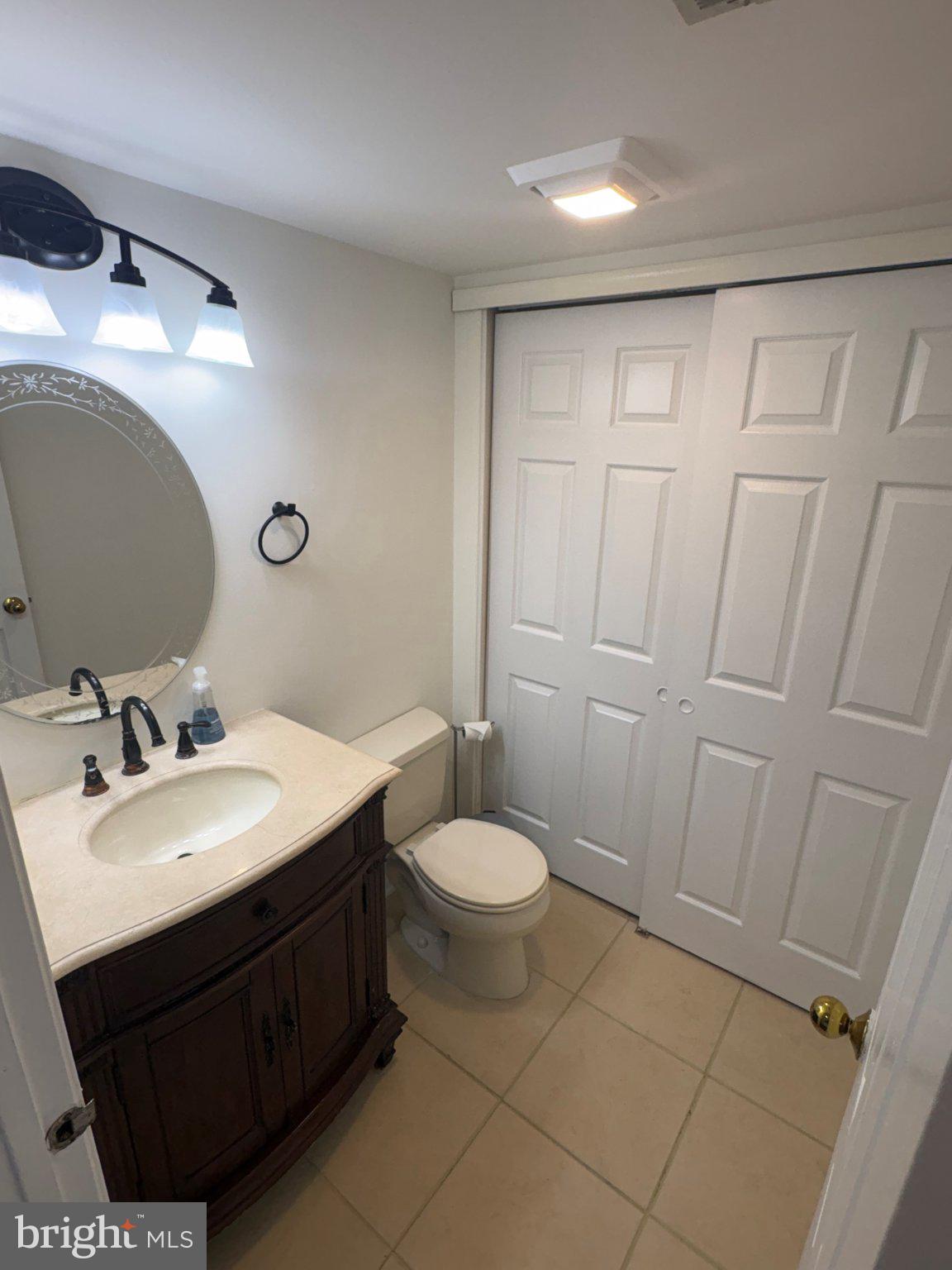 113 North Park Road Newtown, PA 18940 - Photo 24 of 27 a bathroom with a sink and a mirror