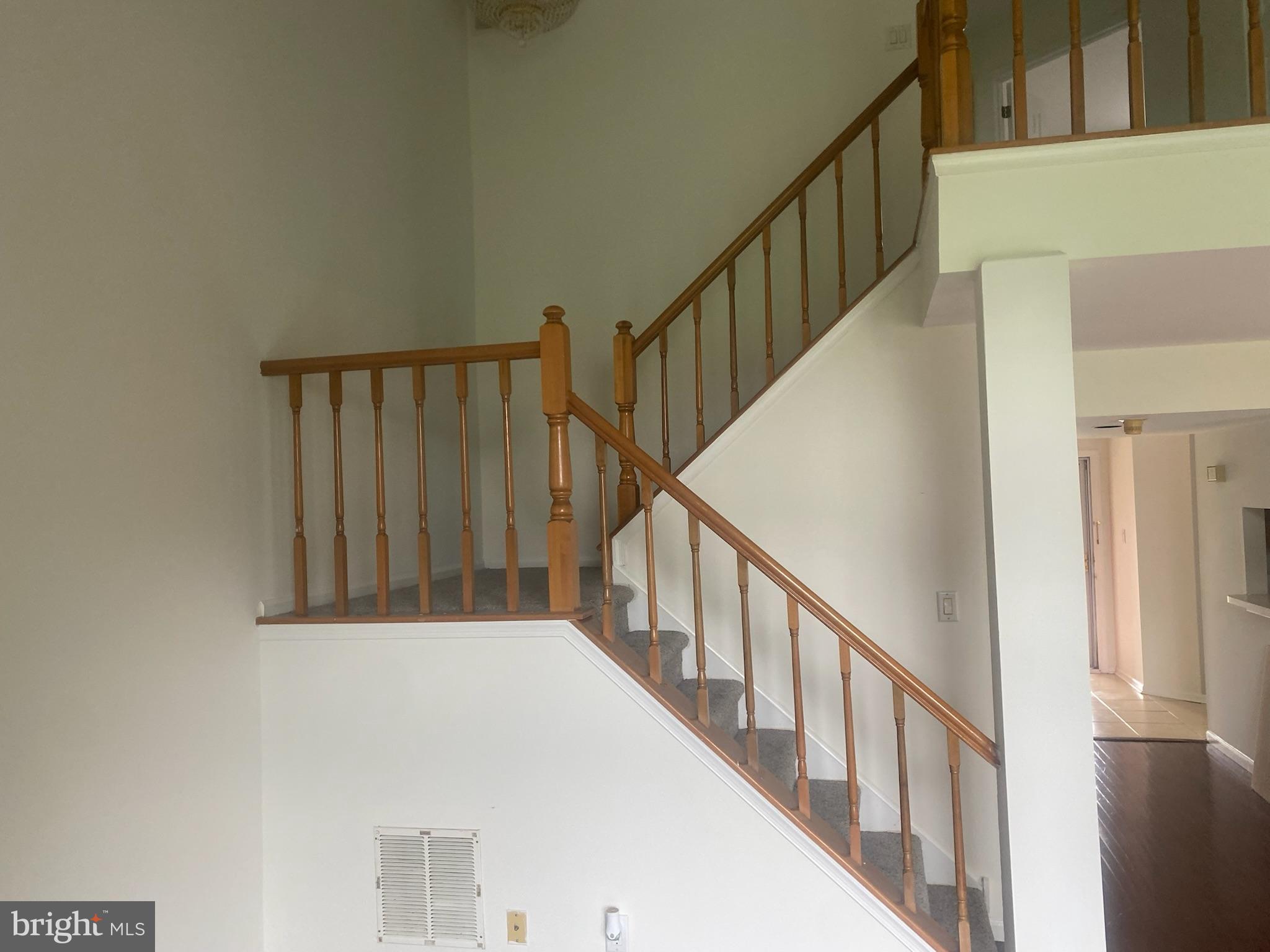 113 North Park Road Newtown, PA 18940 - Photo 5 of 15 a view of staircase with lots of frames on wall and a window