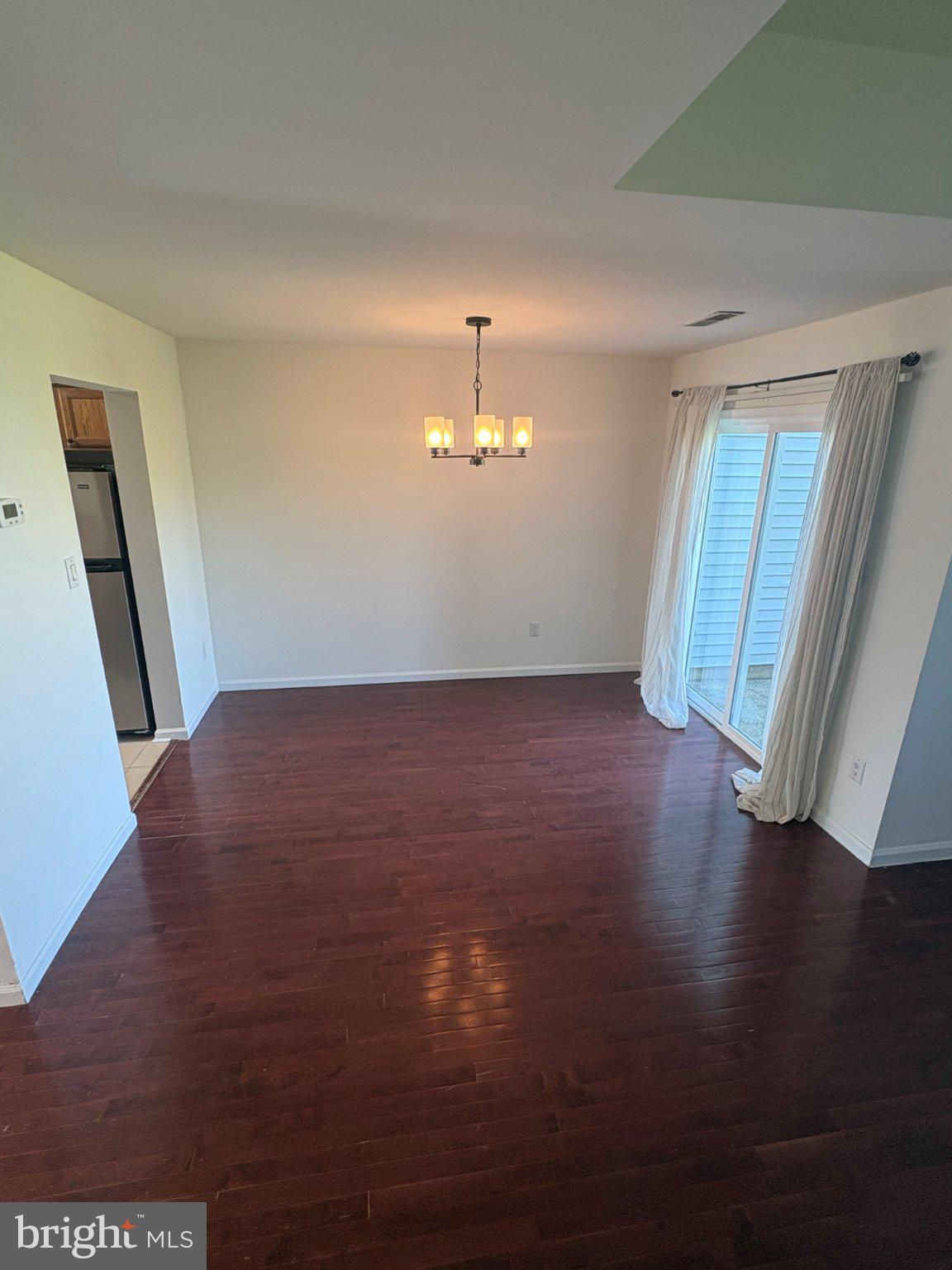 113 North Park Road Newtown, PA 18940 - Photo 6 of 27 wooden floor in an empty room with a window