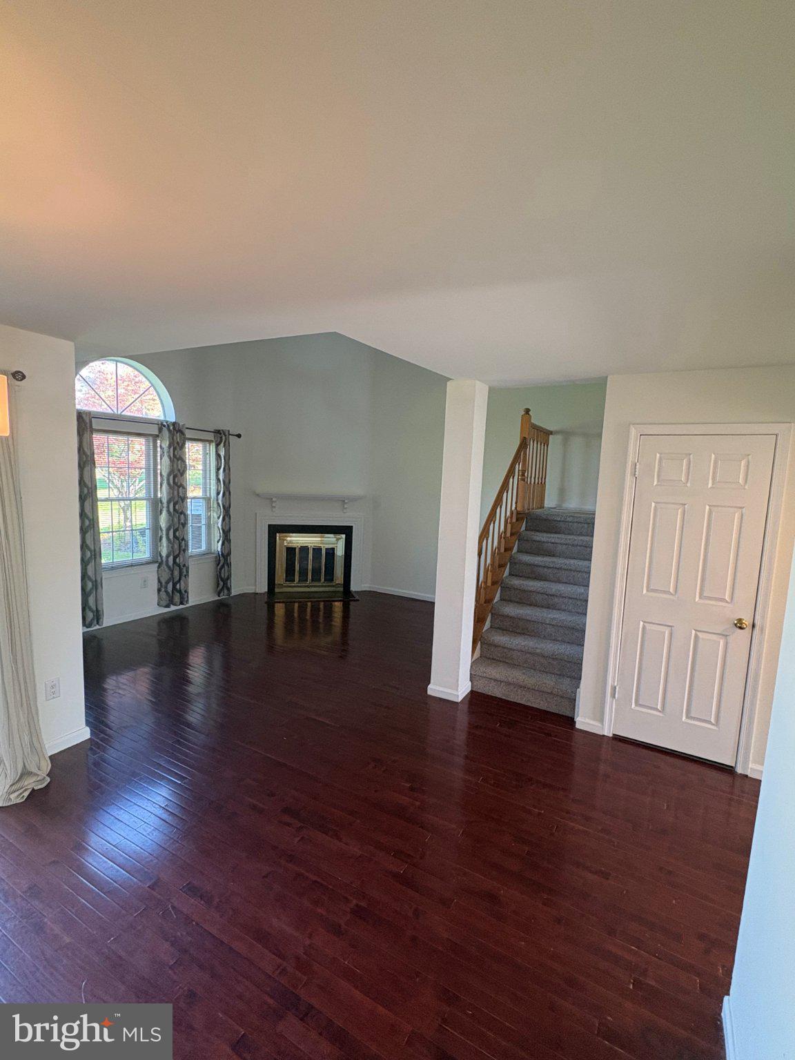 113 North Park Road Newtown, PA 18940 - Photo 8 of 27 an empty room with wooden floor and windows