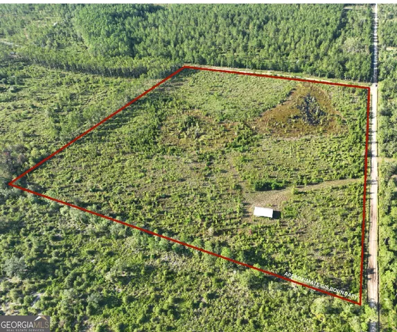 a view of a yard from a balcony