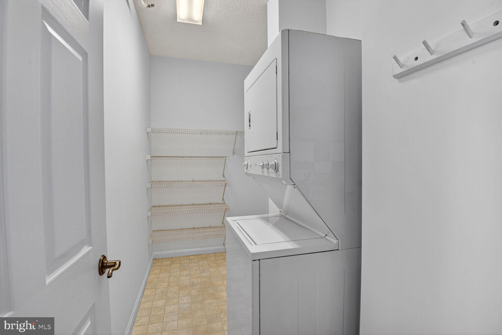 3200 North Leisure World Boulevard, Unit 918 Silver Spring, MD 20906 - Photo 17 of 22 a utility room with dryer and washer