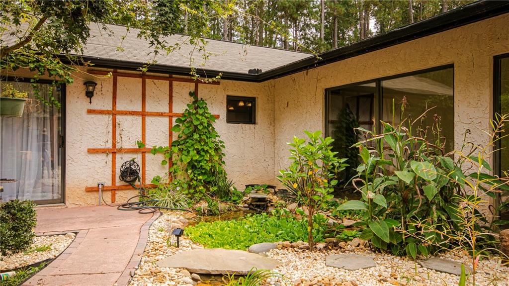 2301 Brooks Road Southeast Dacula, GA 30019 - Photo 17 of 63 a front view of a house with garden