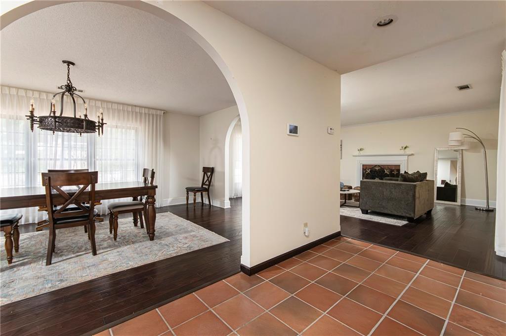2301 Brooks Road Southeast Dacula, GA 30019 - Photo 23 of 63 a view of a dining room with furniture and chandelier