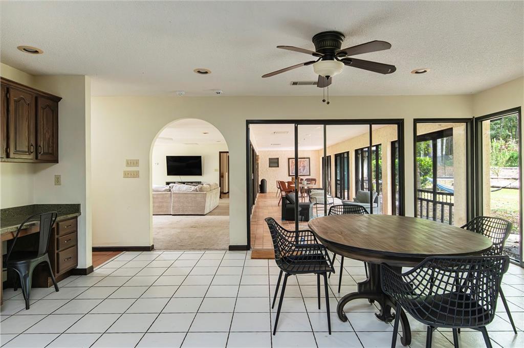 2301 Brooks Road Southeast Dacula, GA 30019 - Photo 30 of 63 a view of a dining room with furniture window and outside view