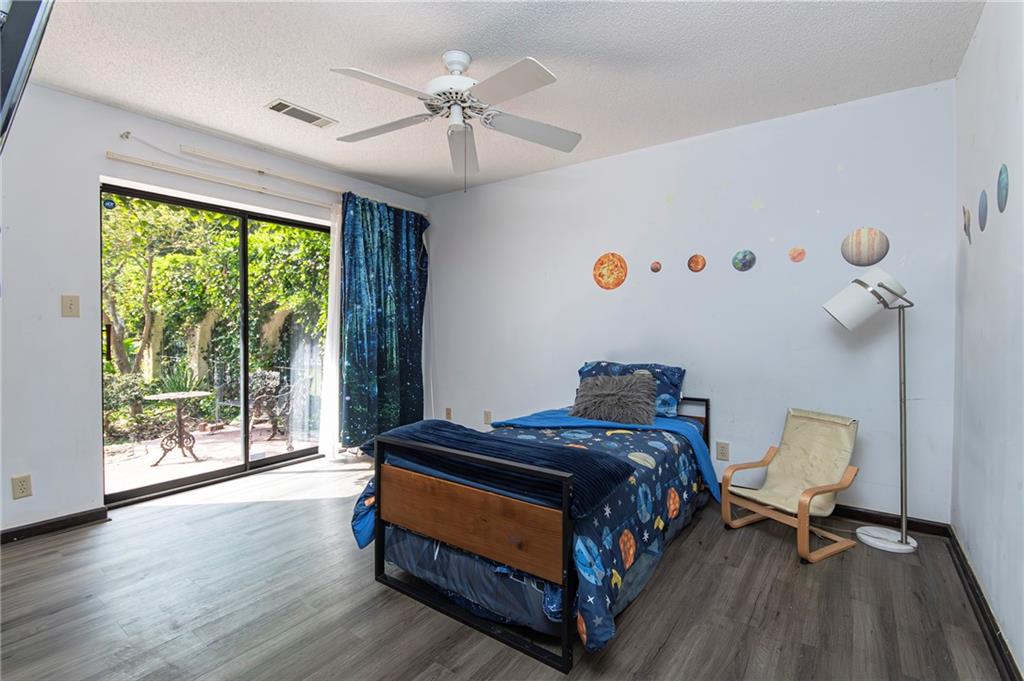 2301 Brooks Road Southeast Dacula, GA 30019 - Photo 48 of 63 a bedroom with a bed and a window