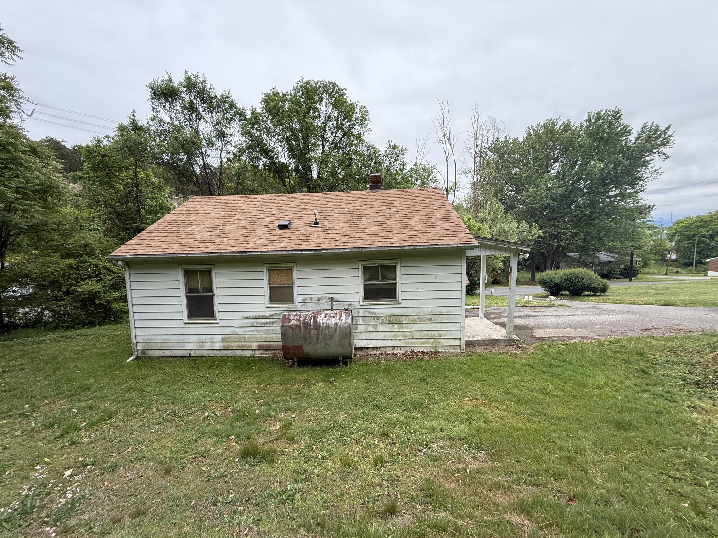 111 Spring Hollow Road Troutville, VA 24175 - Photo 2 of 7 a view of a house with backyard and trees