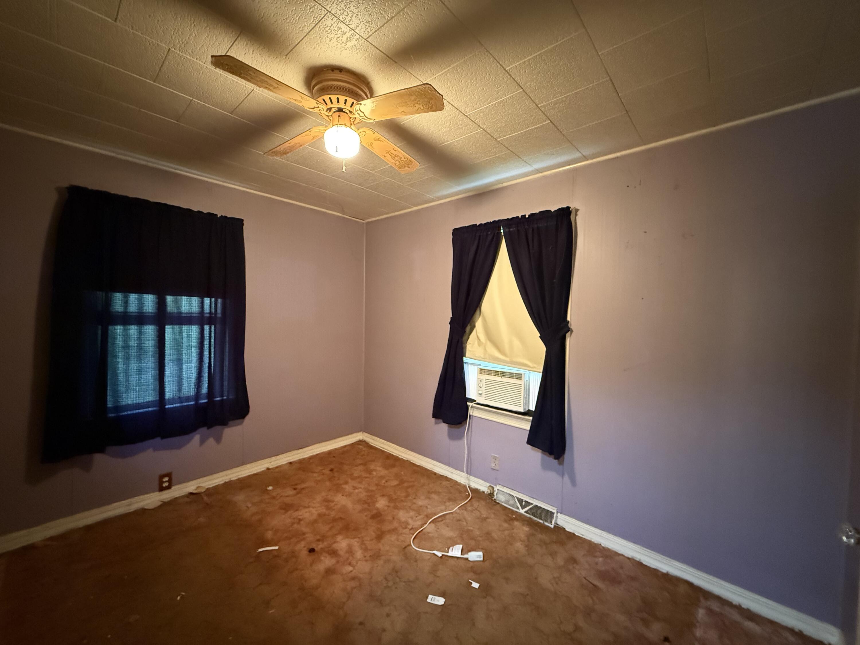 111 Spring Hollow Road Troutville, VA 24175 - Photo 6 of 7 an empty room with windows and closet