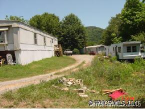 0 Richland Creek Road Clyde, NC 28721 - Photo 2 of 2 a view of a house with a yard