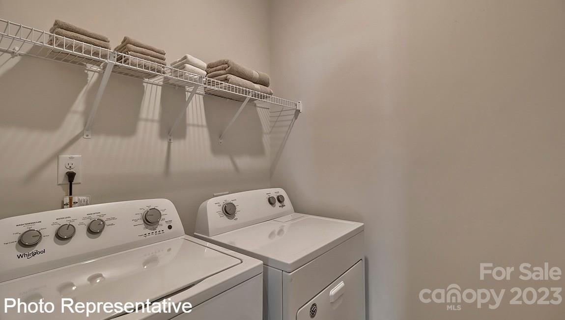 48 Burdock Road Fletcher, NC 28732 - Photo 11 of 30 a utility room with dryer and washer