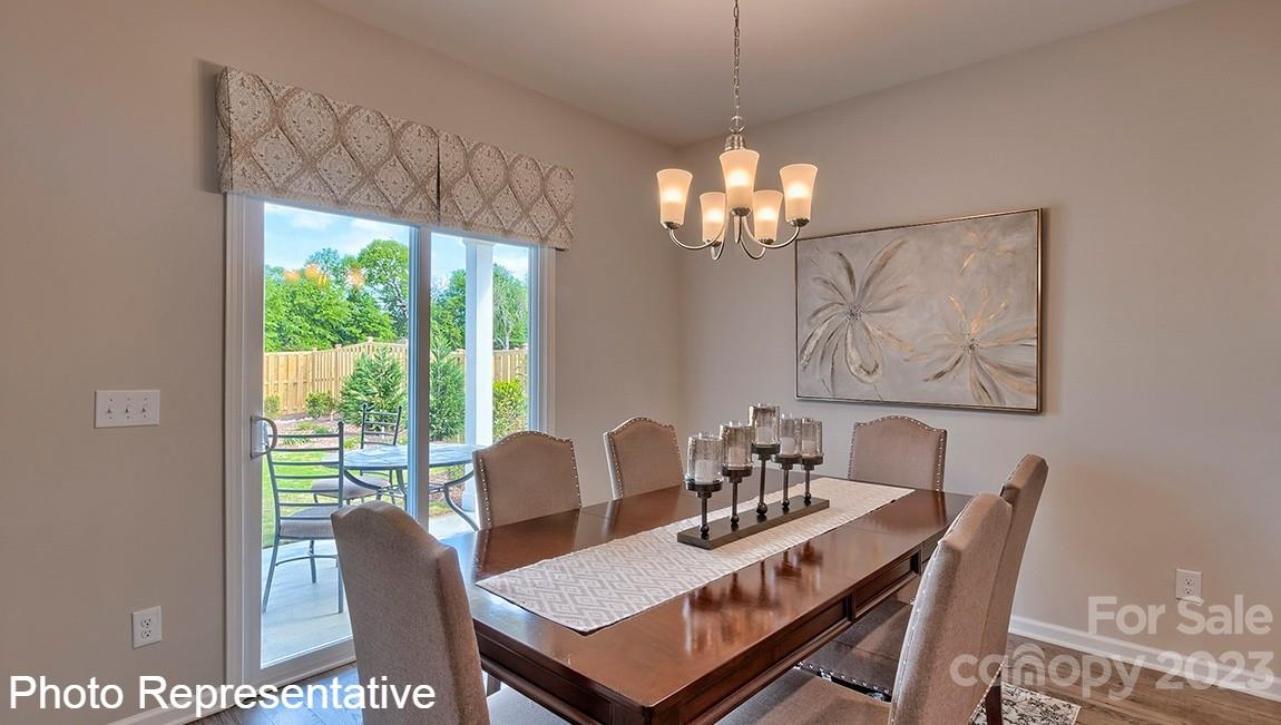 48 Burdock Road Fletcher, NC 28732 - Photo 17 of 30 a view of a dining room with furniture window and outside view