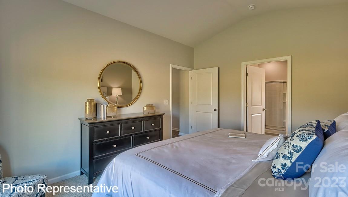 48 Burdock Road Fletcher, NC 28732 - Photo 25 of 30 a bedroom with a bed and a dresser