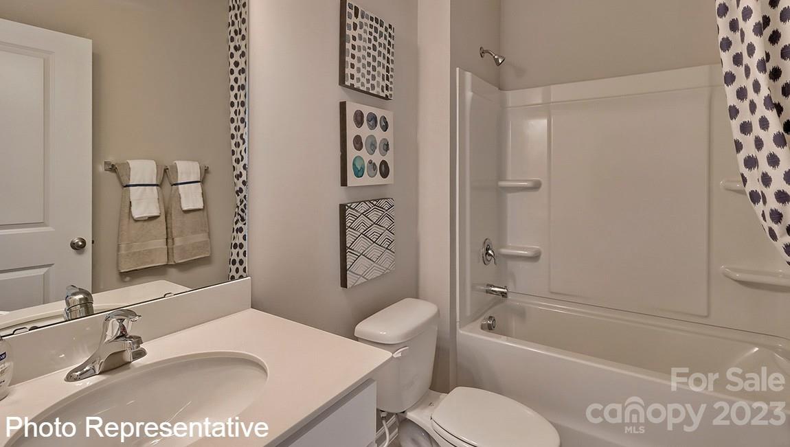 48 Burdock Road Fletcher, NC 28732 - Photo 6 of 30 a bathroom with a sink toilet and shower