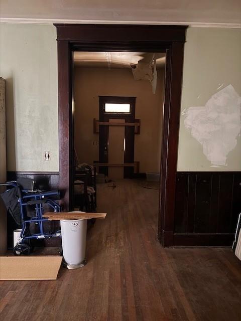 579 17th Street Southeast Paris, TX 75460 - Photo 19 of 22 a room with wooden floor and chair