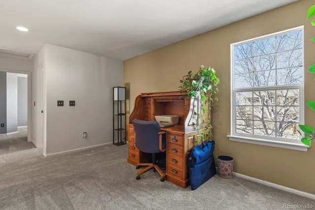 a room with furniture and window