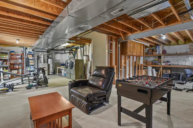 a view of a workspace with furniture