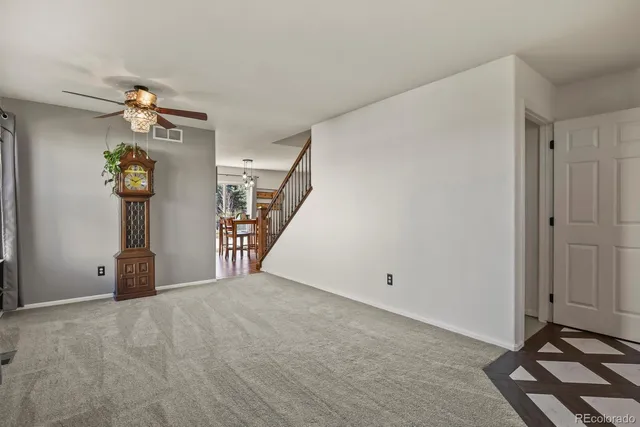 a view of a livingroom with a staircase