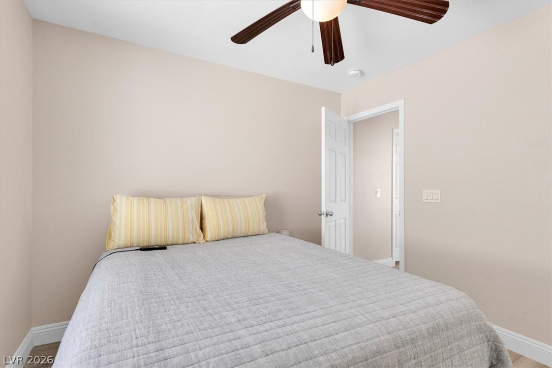 1019 Garnet Ridge Court Las Vegas, NV 89123 - Photo 25 of 34 Bedroom with ceiling fan and light wood-type flooring
